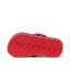 Little Ahi boys sandal sole facing up, showing durable, water-friendly textured outsole with arch support.