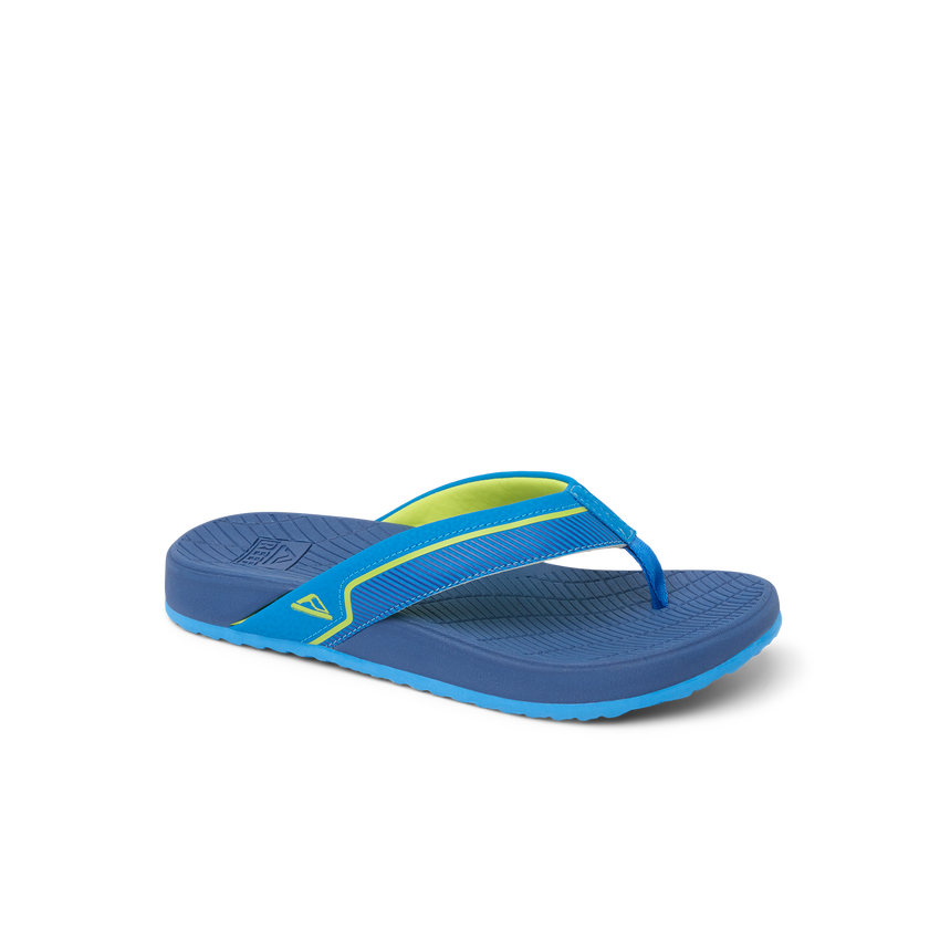 Kids Windswell blue and green flip flop facing left, close-up of side and top showing cushioned footbed and arch support.