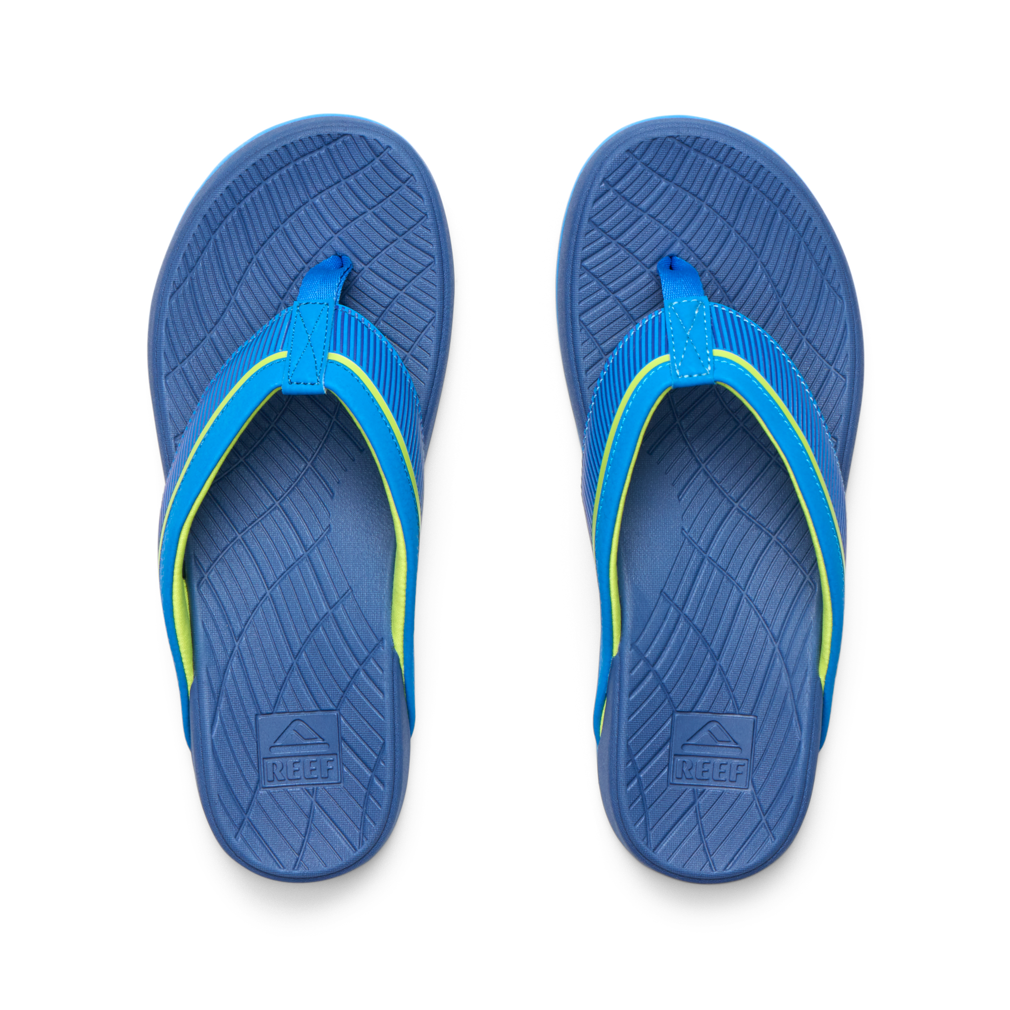 Top view of Kids Windswell blue and volt boys flip flops with anatomical arch support and soft cushioning for beach comfort