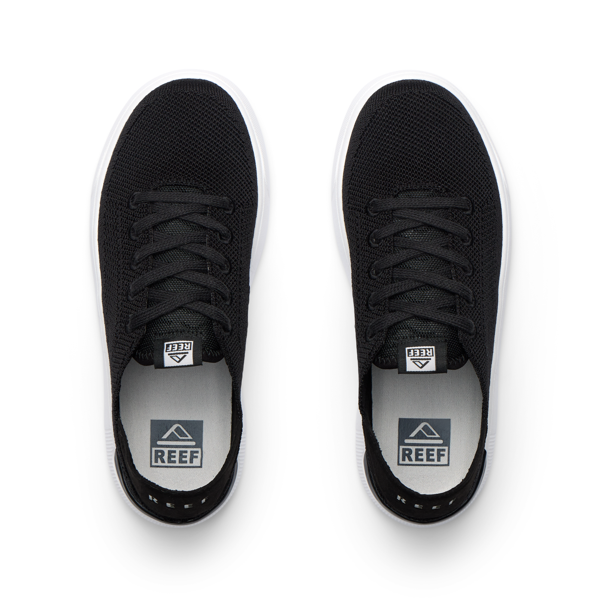 Top view of black Kids Neptune sneakers with breathable knit upper, white sole, and surf-inspired comfort design.