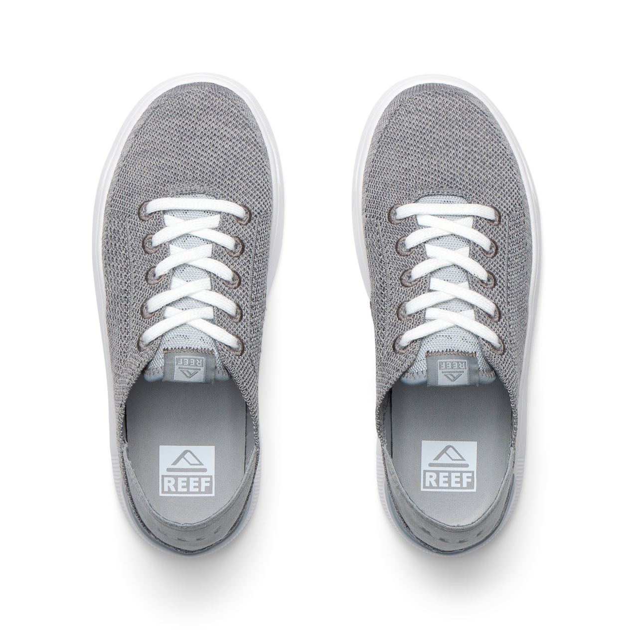Top view of grey Kids Neptune sneakers with breathable knit upper, white laces, and lightweight cushioned sole facing forward