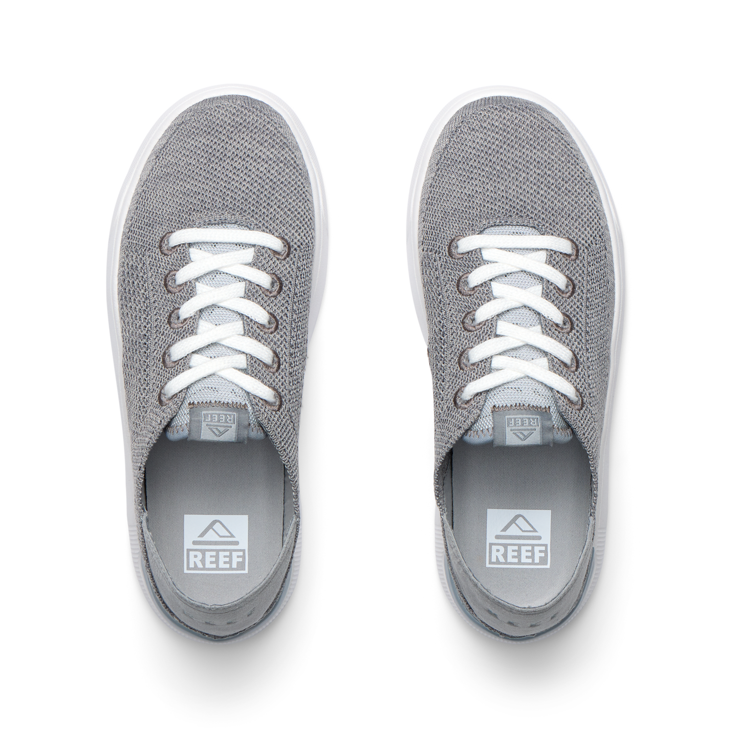 Top view of grey Kids Neptune sneakers with breathable knit upper, white laces, and lightweight cushioned sole facing forward