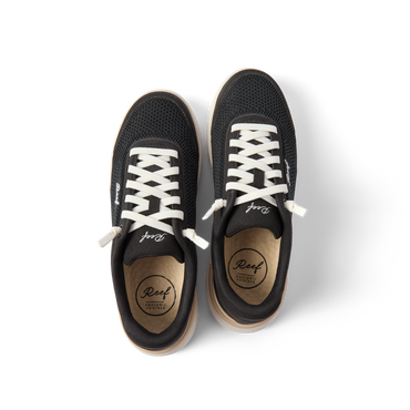 Top view of black Shoreline Palisades sneakers for women with white laces, breathable mesh, and cushioned insoles facing upward.