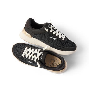 Pair of black Shoreline Palisades sneakers for women, right shoe facing right, left shoe top view, breathable mesh upper.