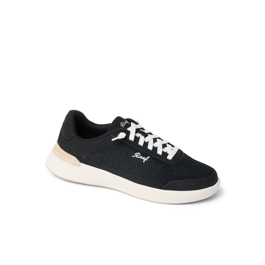 Shoreline Palisades sneaker facing right, black mesh with white laces, cushioned sole for beach-inspired comfort