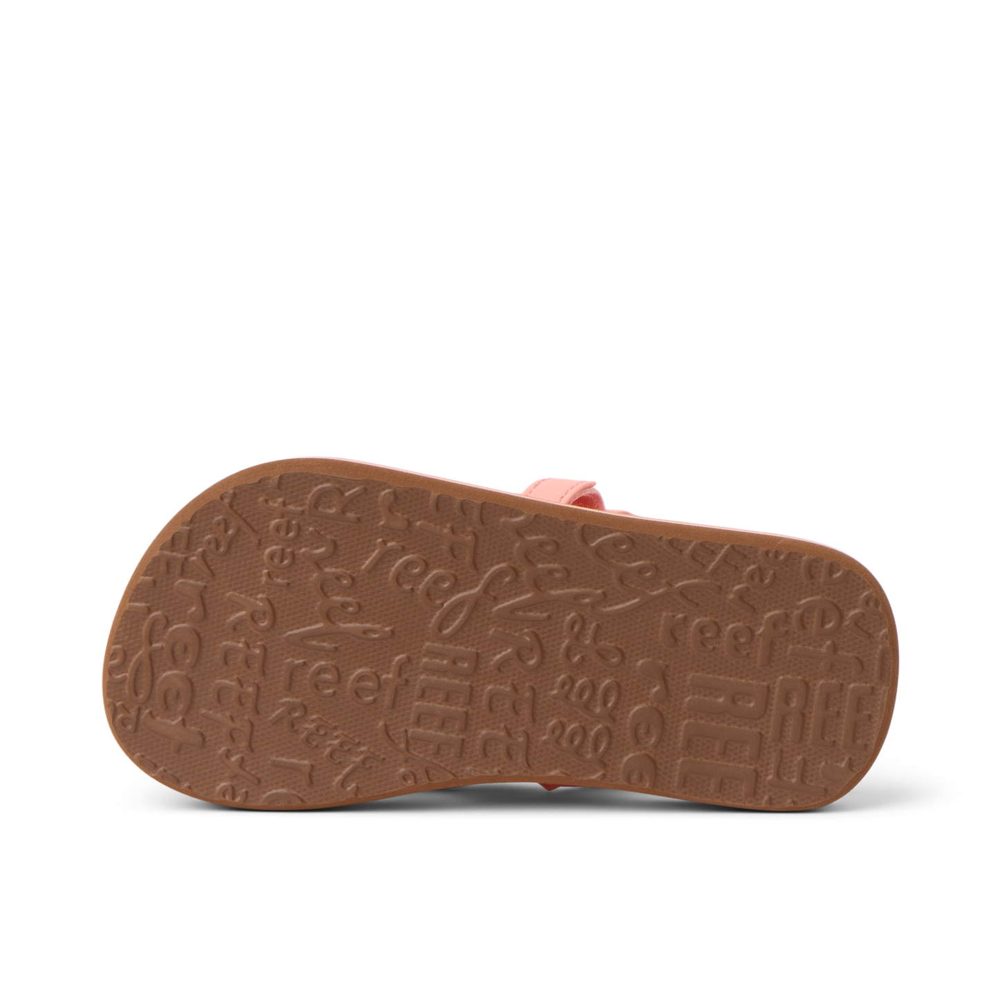 Little Ahi girls’ sandal sole facing up, showing textured outsole with Reef branding, comfort-focused and durable design.