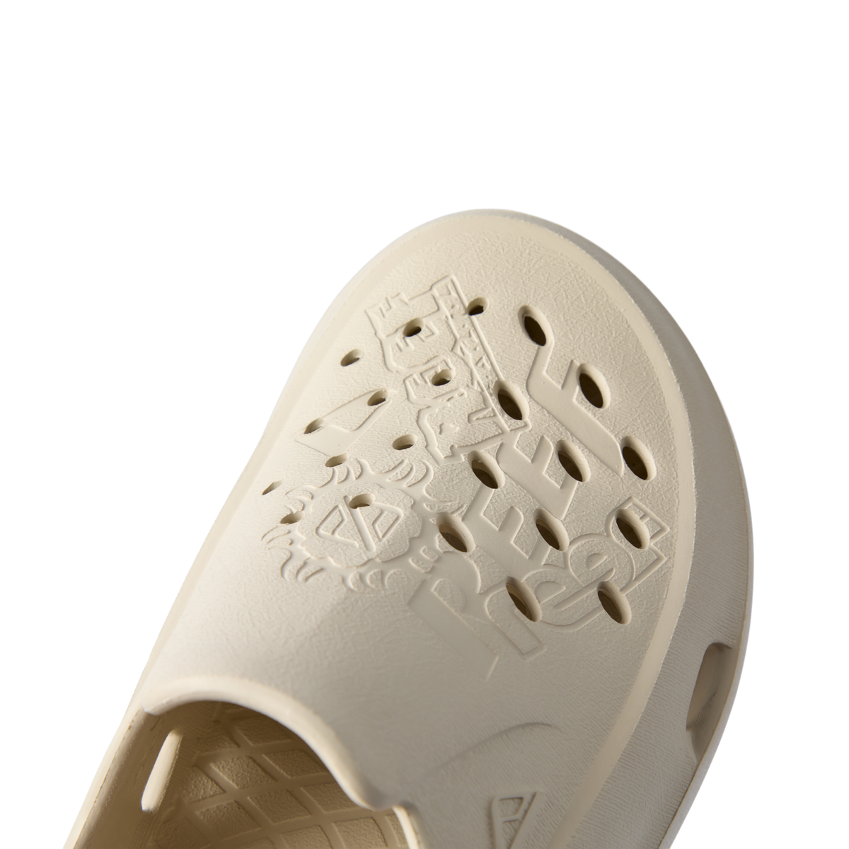Glider water friendly slip on close up of toe facing upper right with perforations and cushioned comfort