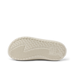 Glider outsole close-up, toe pointing left, with textured tread and molded arch support