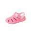 Little Totally Beachin pink girls’ sandal facing left with comfort cushioning and arch support, beach-inspired design.