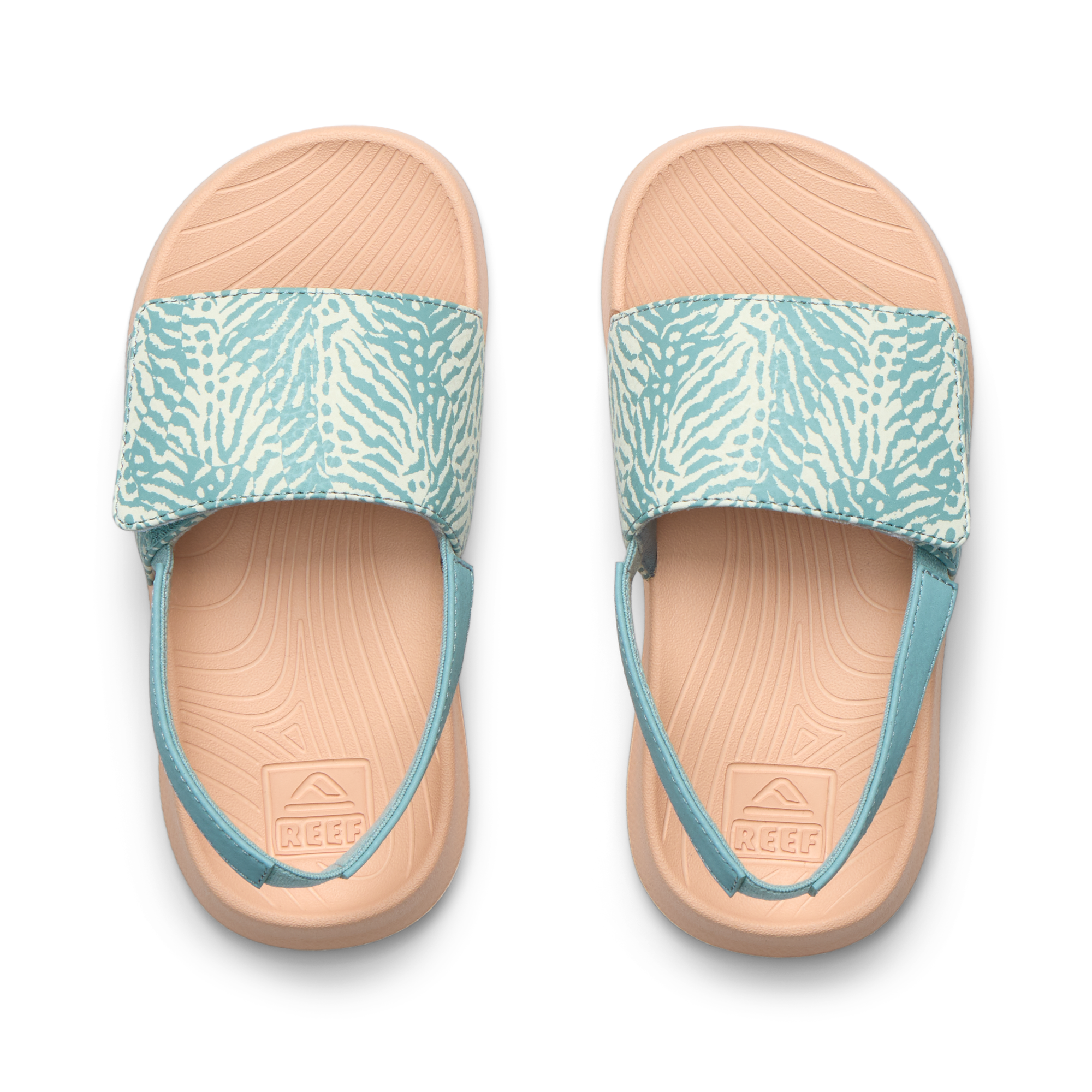 Little Salty Slide sandals for girls, top view facing up, featuring water-friendly, cushioned footbed and patterned straps.