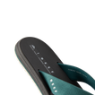 Nox men’s sandal facing left, close-up of the footbed and teal strap with memory foam for beach comfort.