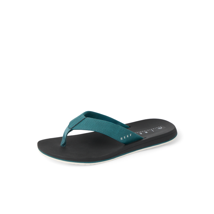 Nox men's teal and black flip flop facing left, showing top and side with anatomical arch support and cushioning.