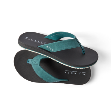 Pair of Nox men's flip flops with teal straps facing right, showing top and sole, designed for comfort and beach wear.