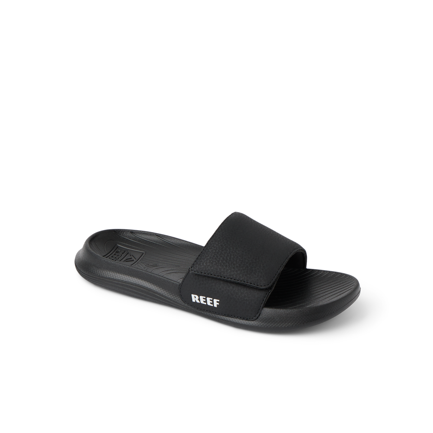 Kids Salty Slide facing right, black and white, beach-inspired slide with anatomical arch support and soft cushioning.