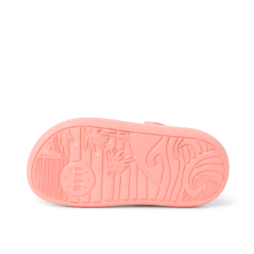Little Rio Slide unisex kids' coral slide showing sole with wave and palm tree design, surf-inspired comfort footwear