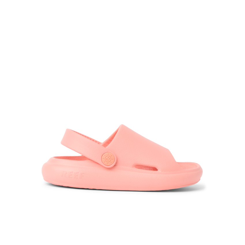 Little Rio Slide coral kids' sandal facing right showing side profile with cushioned sole and supportive strap.