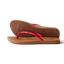 Pair of Cushion Slim women's sandals facing right, side and sole view, red straps, beach-inspired water-friendly design.