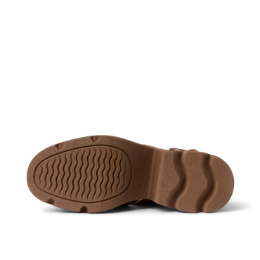 Vista Luxe Lucie women's shoe showing the brown sole with wave-patterned grip, highlighting comfort and durability.