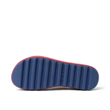 Water Vista Higher women’s footwear showing the blue sole facing up, surf-inspired comfort with arch support and cushioning.