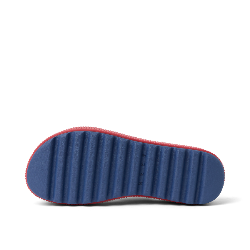 Water Vista Higher women’s footwear showing the blue sole facing up, surf-inspired comfort with arch support and cushioning.
