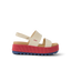Side view of Water Vista Higher women's sandal with thick red platform sole and beige straps, surf-inspired comfort footwear.