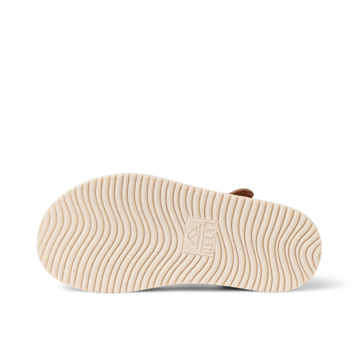 Little Cali Coastin water friendly sandal outsole viewed from below with toe facing right and wavy traction pattern