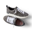 Pair of Neptune Alana women's sneakers with denim cheetah print, white laces, and anatomical arch support, top and side views.