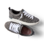Pair of Neptune Alana women's sneakers with denim cheetah print, white laces, and anatomical arch support, top and side views.