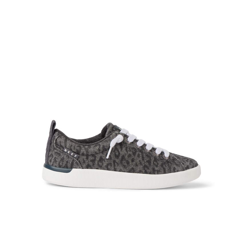 Neptune Alana right-facing sneaker with denim cheetah print, cushioned sole, anatomical arch support for beach comfort.