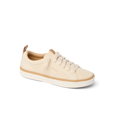 Side view of Lay Day Lite women's sneaker in beige with knit upper, lace-up, comfort features, and surf-inspired design.