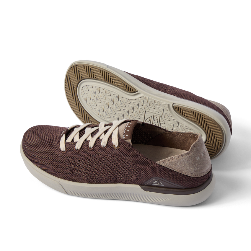 Neptune HT brown sneakers facing left with cushioned soles and textured outsoles