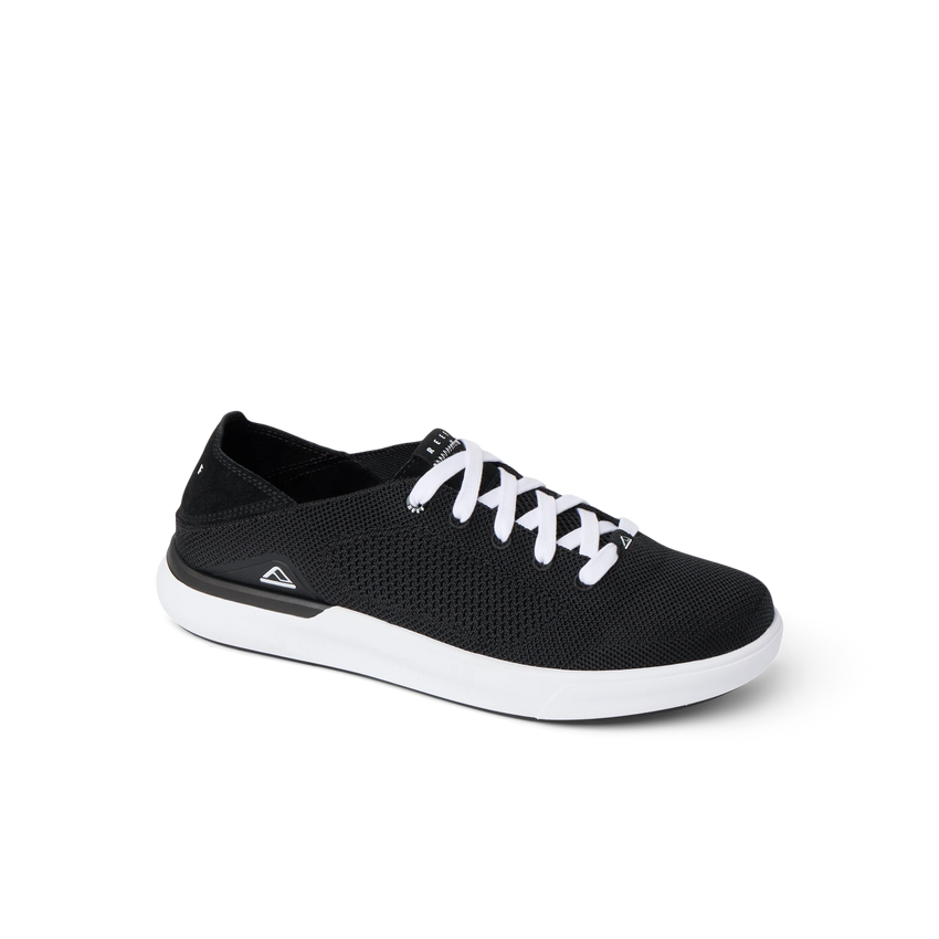 Side view of Neptune HT men's black sneaker with white sole and laces, featuring REEF's soft cushioning and arch support.