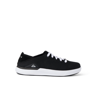 Neptune HT men's black sneaker facing right, showing lightweight knit upper with cushioned white sole, surf-inspired comfort design.