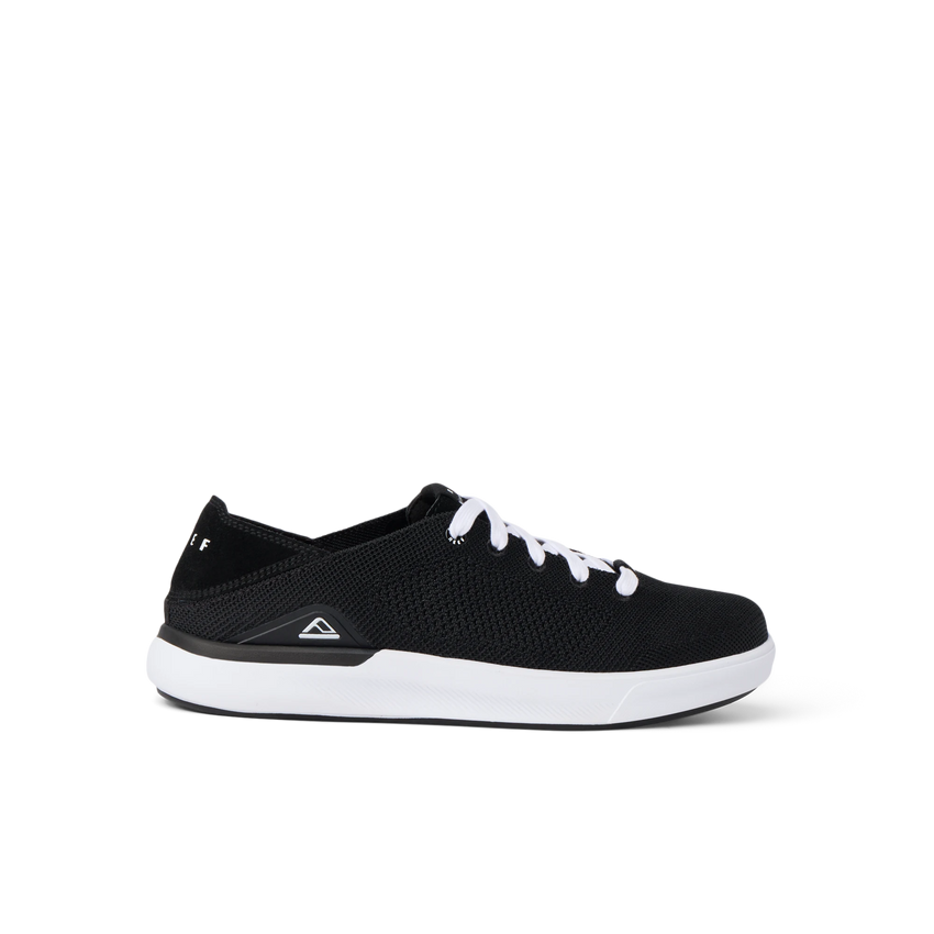 Neptune HT men's black sneaker facing right, showing lightweight knit upper with cushioned white sole, surf-inspired comfort design.