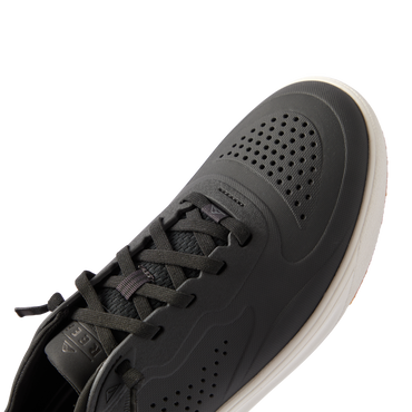Close-up of Shoreline Del Mar H2O sneaker facing right, black with white sole, water-friendly and extra cushioned for beach comfort.