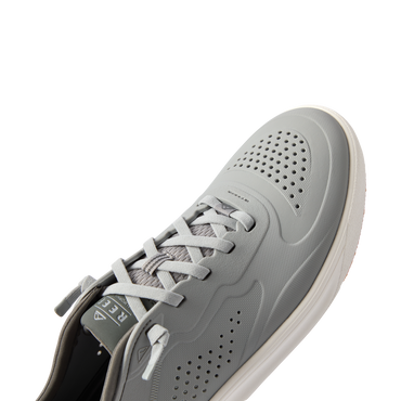 Close-up of the Shoreline Del Mar H2O sneaker facing right, showcasing breathable grey upper and lace detail with arch support.