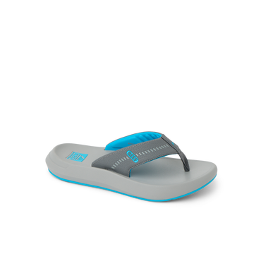 Cruiser sandal facing right, showing charcoal and aqua straps with cushioned footbed for all-day comfort.
