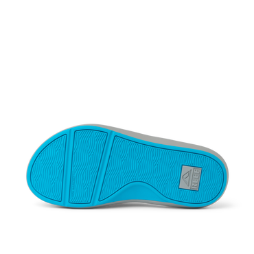 Cruiser footwear sole facing up showing aqua blue water-friendly outsole with anatomical arch support and durable design.