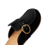Vista Siena black suede clog close up, facing lower left, with buckle and cork footbed