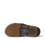 Fanning + Slide sandal sole facing up, showing brown textured tread and black oversized airbag heel for cushion comfort