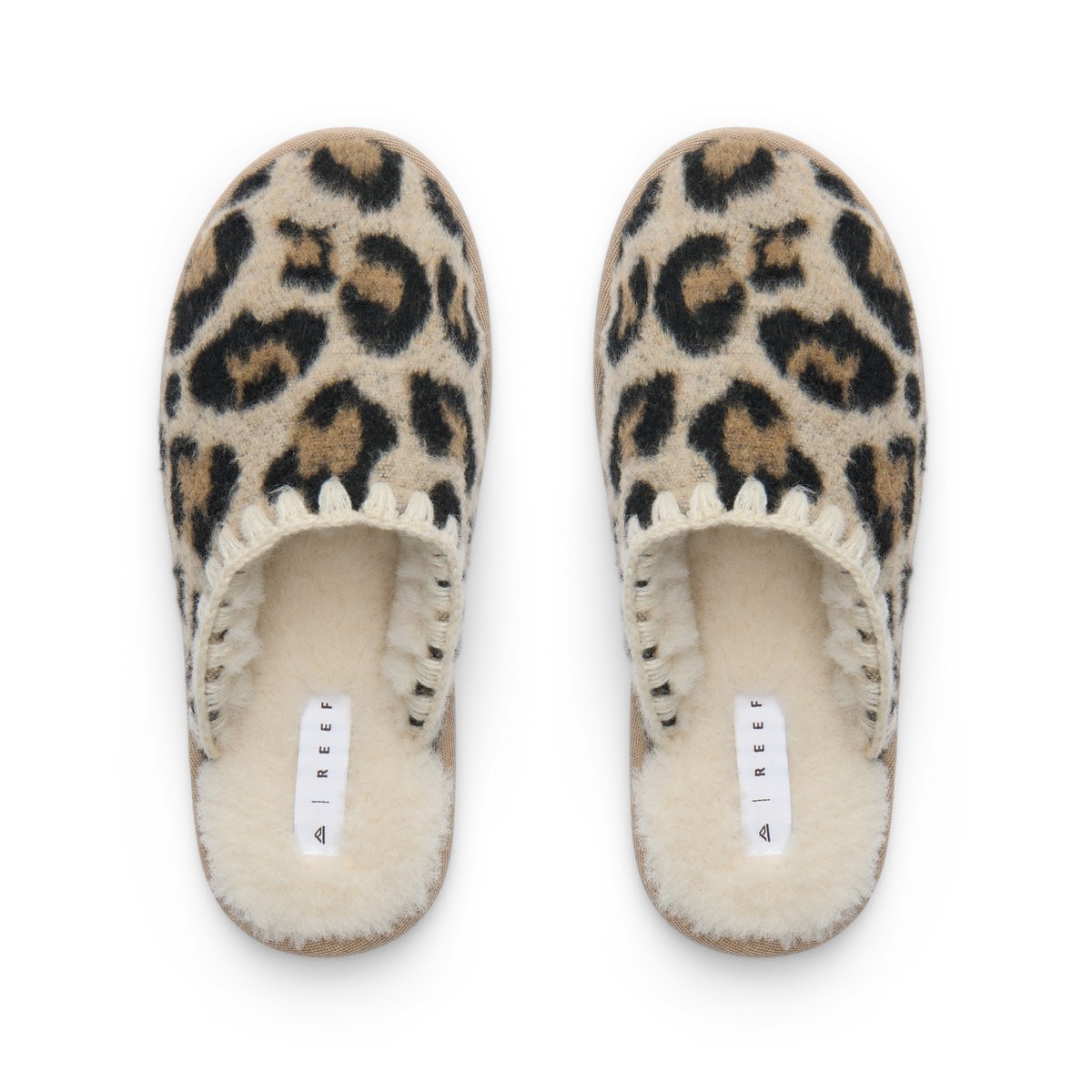 Iryss Slipper pair facing upward with leopard print uppers and plush fleece lining