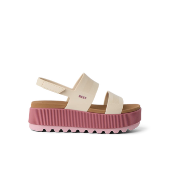 REEF platform sandal facing right with cream straps and a pink ridged sole