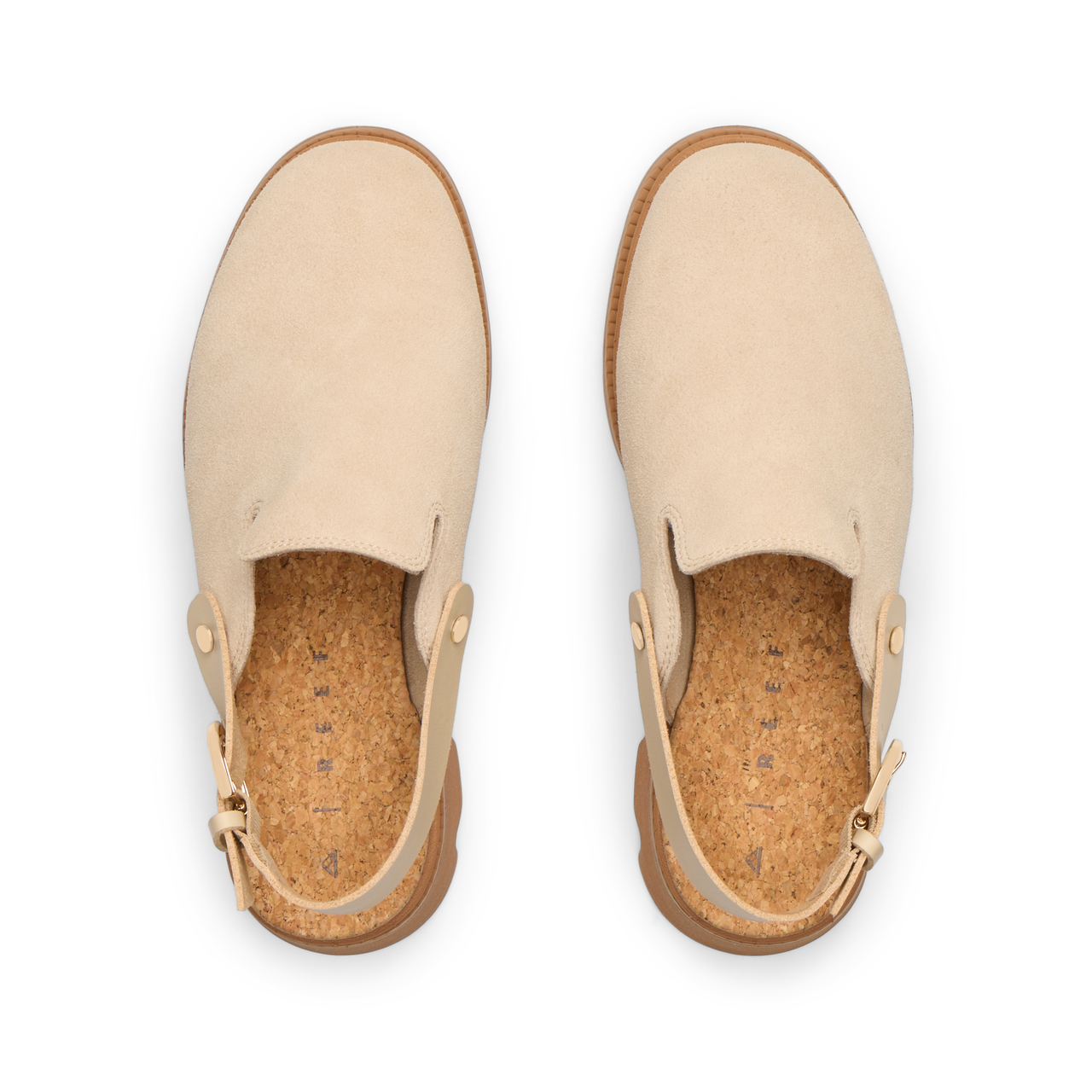 Vista Luxe Solene platform clogs facing upwards, showing soft suede upper and cork footbed for surf-inspired comfort.