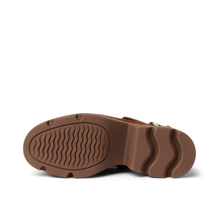 Vista Luxe Solene clog sole close-up showing brown platform outsole with structured arch support, facing upwards.
