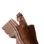 Vista Luxe Solene brown suede clog facing left, close-up of front and adjustable buckle strap with platform sole.