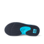 Fanning flip flop underside close up facing left, showing herringbone outsole, blue heel airbag, and REEF logo