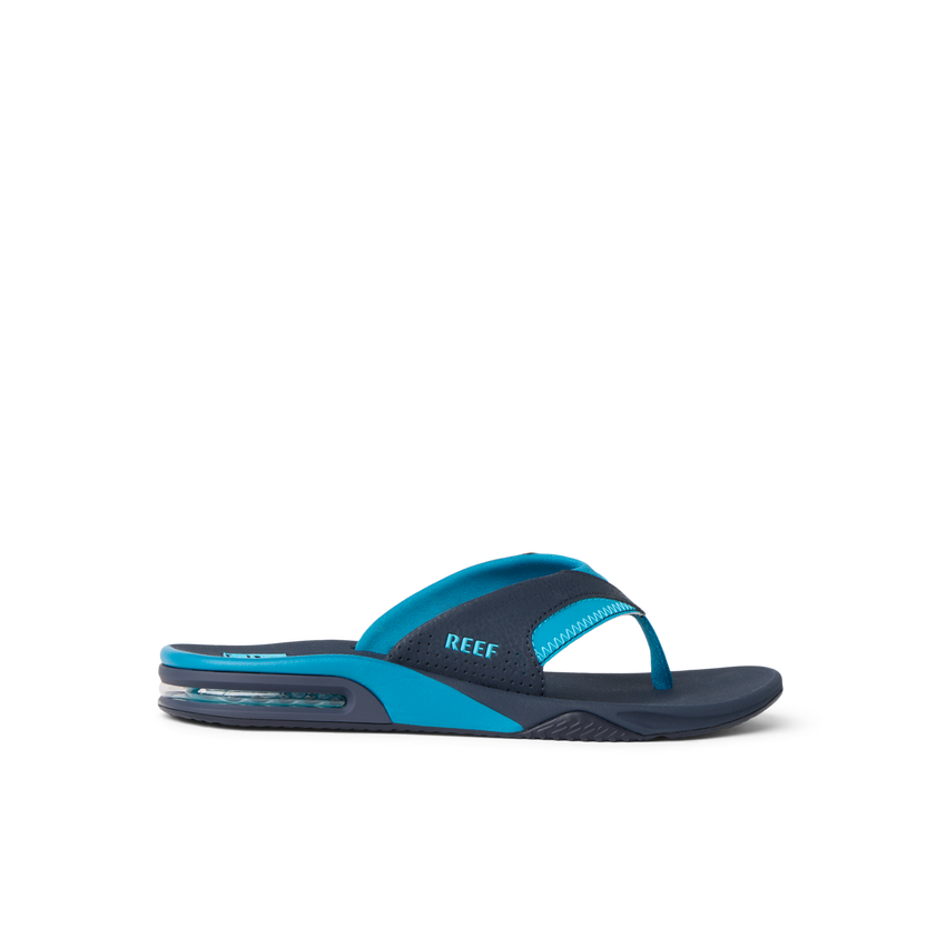 Fanning blue flip flop facing right with cushioned footbed and arch support