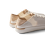 Reef Neptune women's white champagne sneakers facing back right, showing heel and side with surf-inspired comfort features.