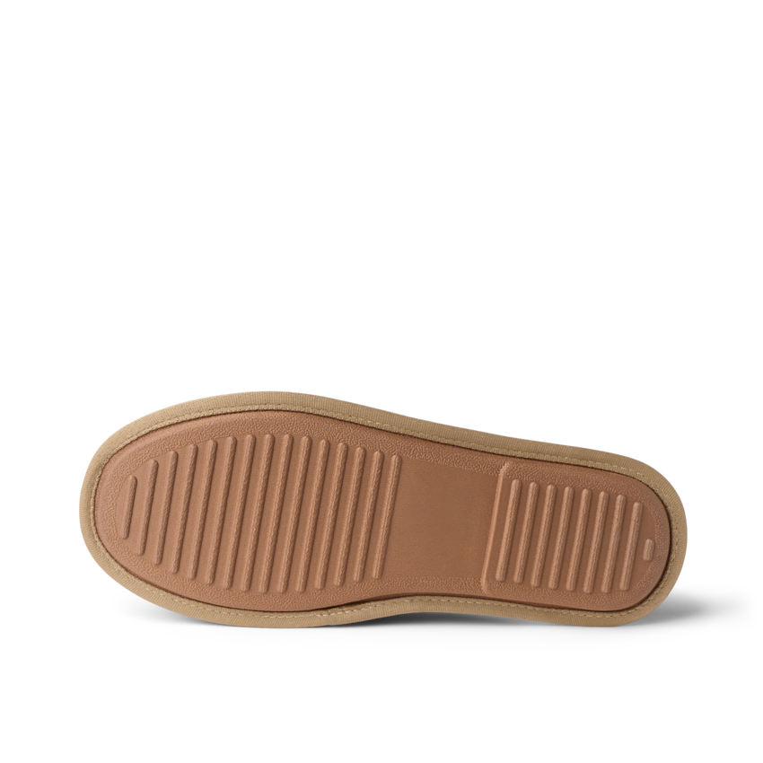Slacktide Slipper outsole close-up, viewed from below with toe pointing right and textured tread visible