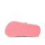 Little Ahi girls’ sandal showing bottom sole facing up with textured REEF branding in pink, lightweight comfort design.